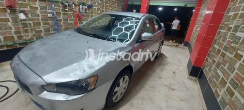 ميتسوبيشي لانسر اى اكس شارك 2015 فضي مستعملة للبيع - 7