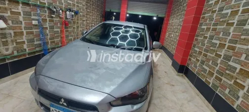 ميتسوبيشي لانسر اى اكس شارك 2015 فضي مستعملة للبيع - 8