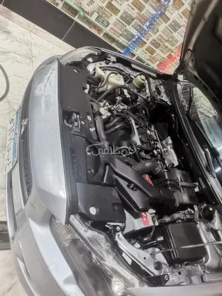 ميتسوبيشي لانسر اى اكس شارك 2015 فضي مستعملة للبيع