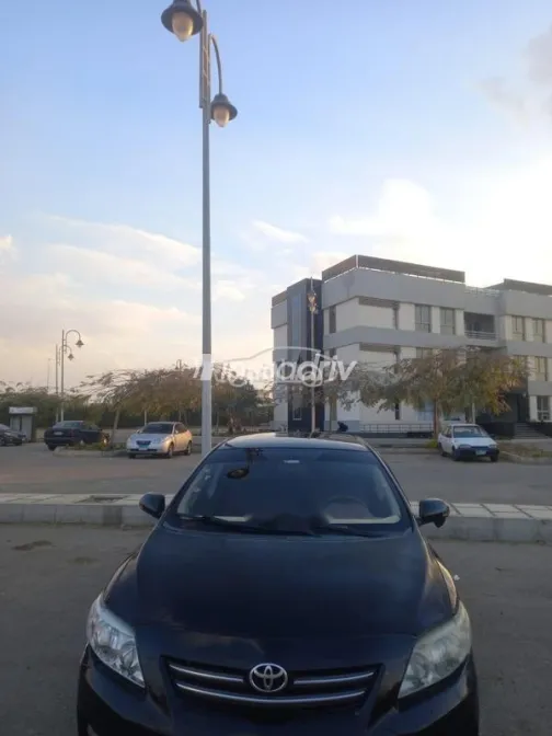 تويوتا كورولا 2010 أسود مستعملة للبيع - 1