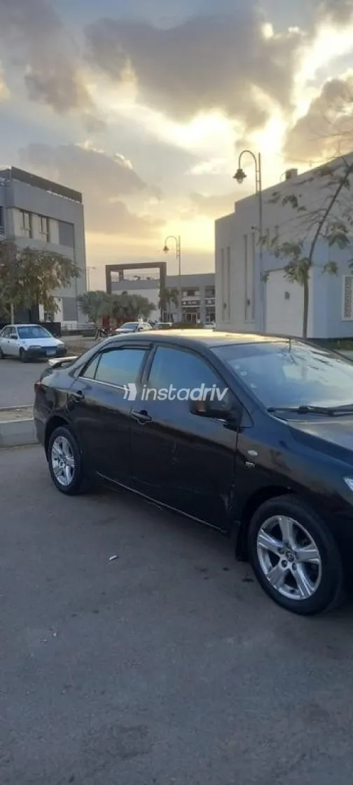 تويوتا كورولا 2010 أسود مستعملة للبيع - 3