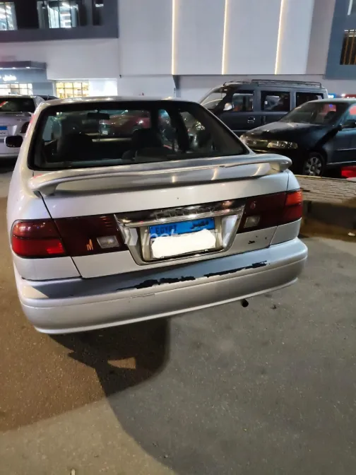 نيسان صنى 1998 أبيض مستعملة للبيع - 9