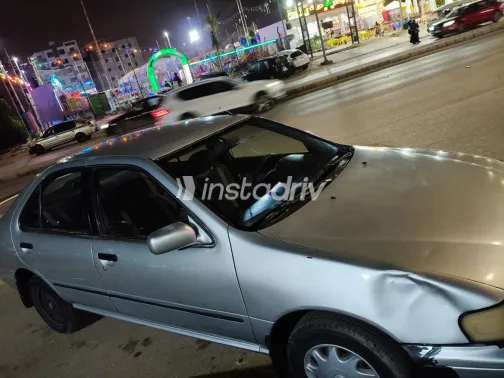 نيسان صنى 1998 أبيض مستعملة للبيع - 10