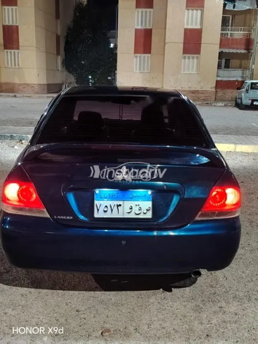 ميتسوبيشي لانسر بومة 2007 أزرق غامق مستعملة للبيع - 1