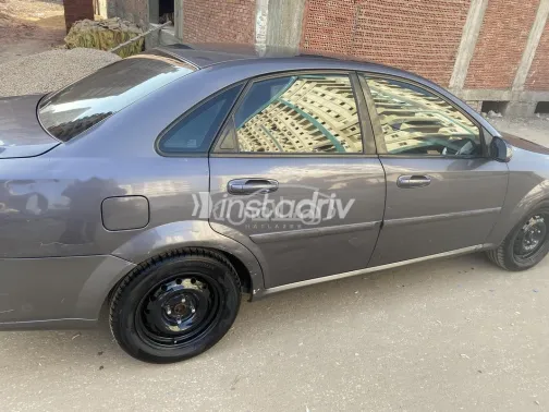 شيفروليه أوبترا 2013 رمادي غامق مستعملة للبيع - 2