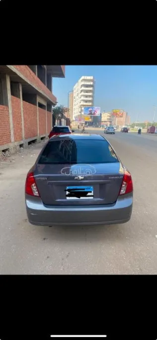 شيفروليه أوبترا 2013 رمادي غامق مستعملة للبيع