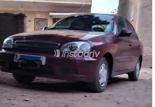 شيفروليه لانوس 2013 أحمر غامق مستعملة للبيع - 1