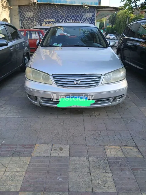 نيسان صنى 2006 أبيض مستعملة للبيع - 2