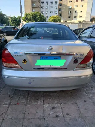 نيسان صنى 2006 أبيض مستعملة للبيع