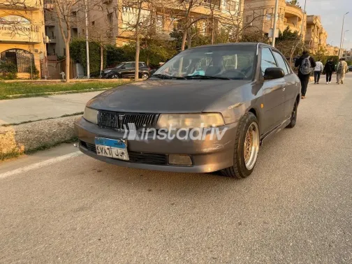 ميتسوبيشي لانسر كرستالة 1999 رمادي غامق مستعملة للبيع - 2