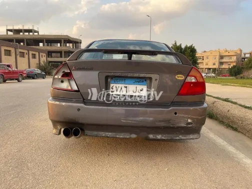 ميتسوبيشي لانسر كرستالة 1999 رمادي غامق مستعملة للبيع - 7