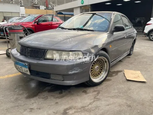 ميتسوبيشي لانسر كرستالة 1999 رمادي غامق مستعملة للبيع - 8