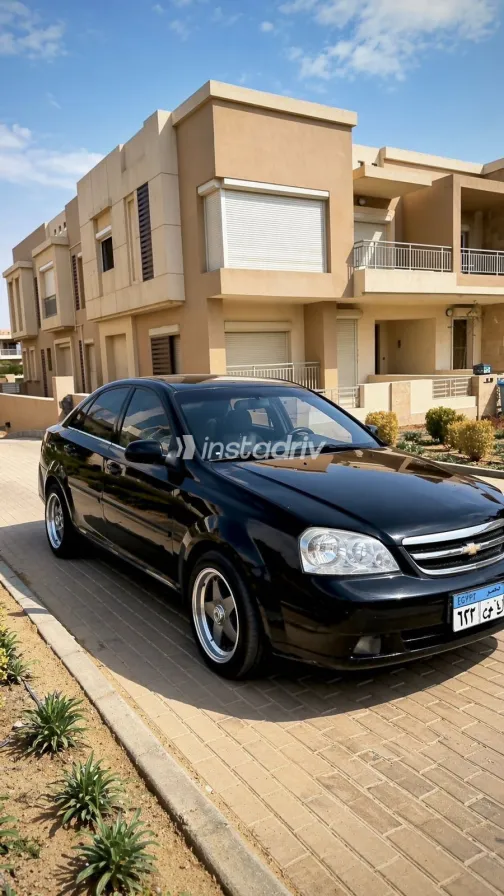 شيفروليه أوبترا 2009 أبيض مستعملة للبيع - 2