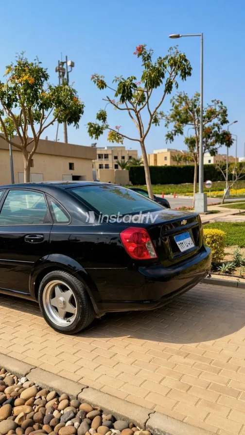 شيفروليه أوبترا 2009 أبيض مستعملة للبيع - 3