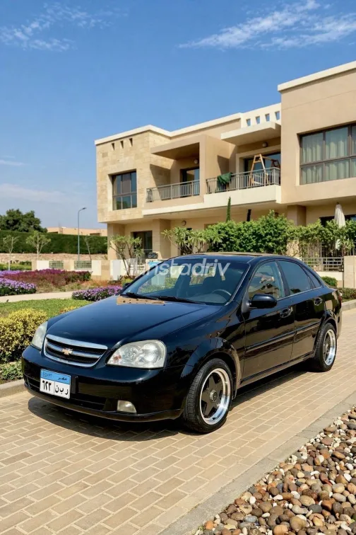 شيفروليه أوبترا 2009 أبيض مستعملة للبيع - 4