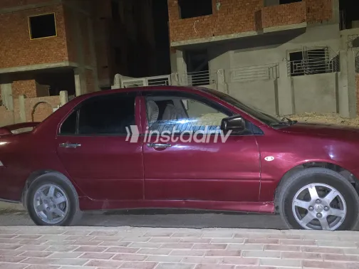 ميتسوبيشي لانسر بومة 2009 أبيض مستعملة للبيع - 3