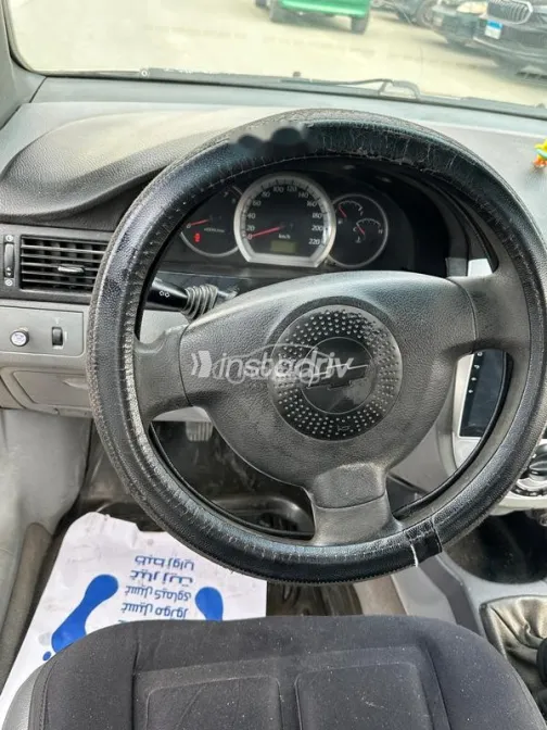 شيفروليه أوبترا 2006 ذهبي مستعملة للبيع - 3