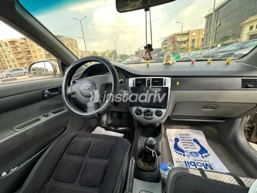 شيفروليه أوبترا 2006 ذهبي مستعملة للبيع - 8