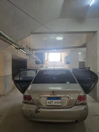 ميتسوبيشي لانسر بومة 2008 أسود مستعملة للبيع