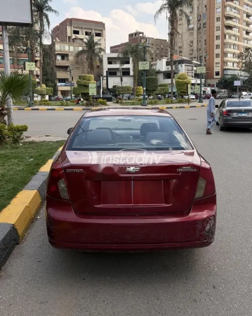 شيفروليه أوبترا 2008 أحمر غامق مستعملة للبيع - 2