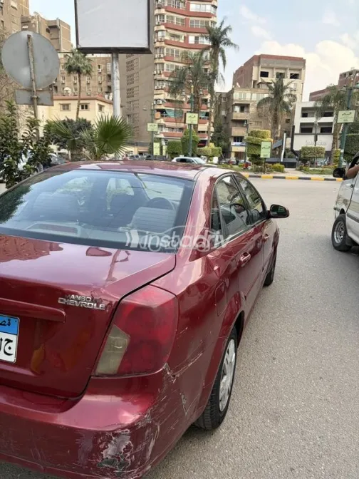 شيفروليه أوبترا 2008 أحمر غامق مستعملة للبيع - 3