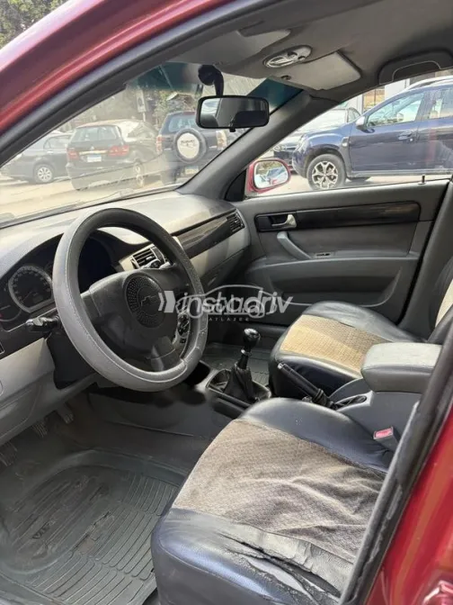 شيفروليه أوبترا 2008 أحمر غامق مستعملة للبيع - 4