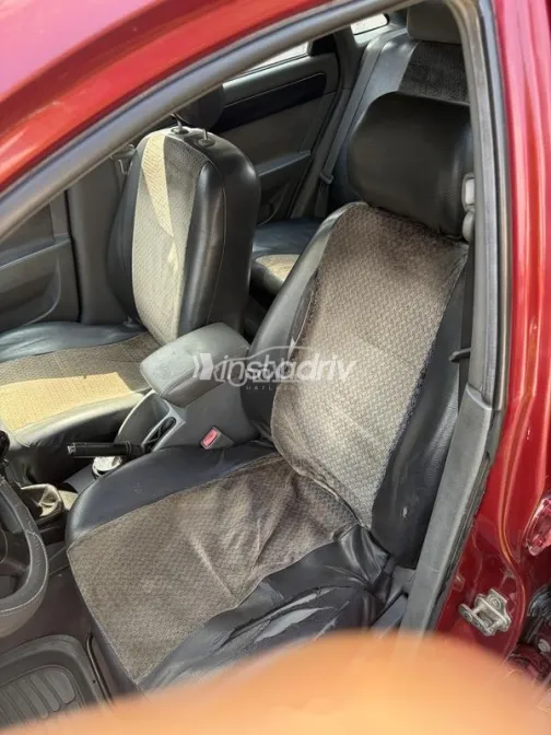 شيفروليه أوبترا 2008 أحمر غامق مستعملة للبيع - 5