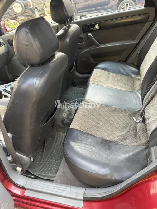 شيفروليه أوبترا 2008 أحمر غامق مستعملة للبيع - 7