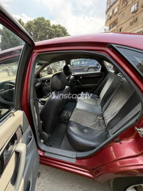 شيفروليه أوبترا 2008 أحمر غامق مستعملة للبيع - 8