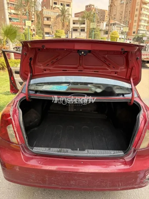 شيفروليه أوبترا 2008 أحمر غامق مستعملة للبيع - 9