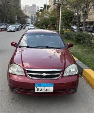 شيفروليه أوبترا 2008 أحمر غامق مستعملة للبيع