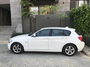 بي ام دبليو 116 2012 أبيض مستعملة للبيع