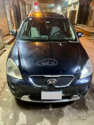 كيا كادنزا 2011 أبيض مستعملة للبيع