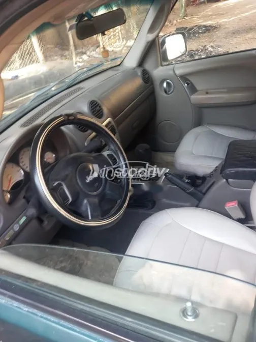 جيب ليبيرتى 2002 أخضر غامق مستعملة للبيع - 4