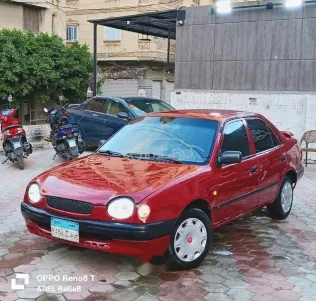 تويوتا كورولا 1999 أحمر مستعملة للبيع