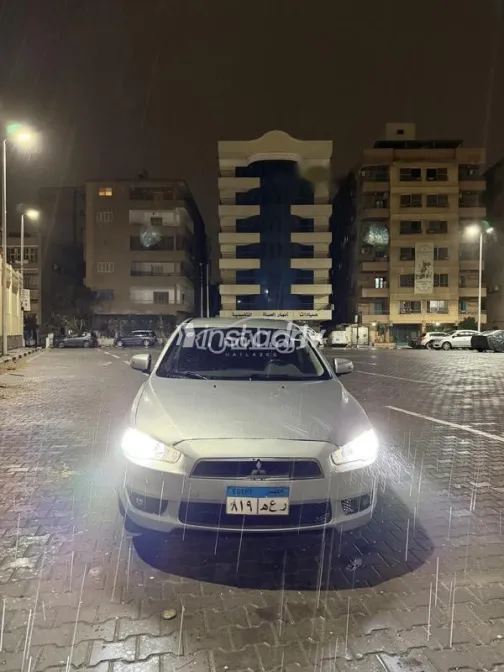ميتسوبيشي لانسر اى اكس شارك 2015 فضي مستعملة للبيع - 2