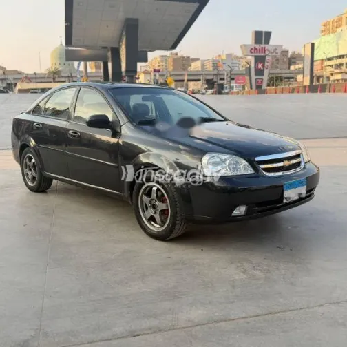 شيفروليه أوبترا 2011 أسود مستعملة للبيع - 2