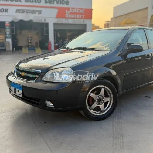 شيفروليه أوبترا 2011 أسود مستعملة للبيع - 3