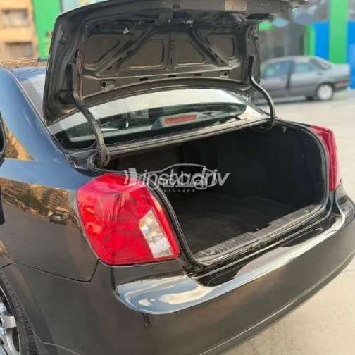 شيفروليه أوبترا 2011 أسود مستعملة للبيع - 7