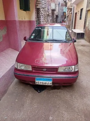 هيونداي اكسيل 1994 أحمر غامق مستعملة للبيع