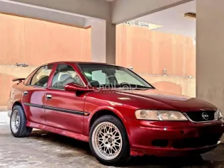 اوبل فيكترا 2001 أحمر غامق مستعملة للبيع