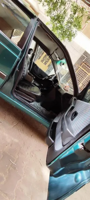 بيجو 405 1998 أخضر غامق مستعملة للبيع