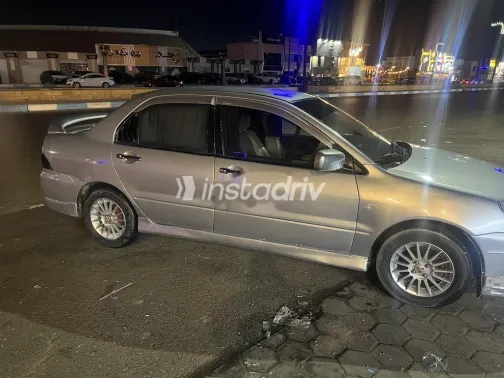 ميتسوبيشي لانسر بومة 2006 فضي مستعملة للبيع - 7