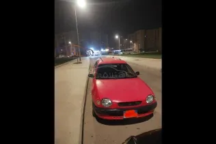تويوتا كورولا 1998 أحمر مستعملة للبيع