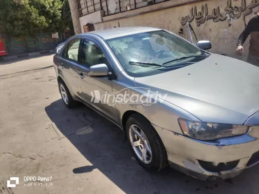 ميتسوبيشي لانسر 2014 رمادي غامق مستعملة للبيع - 2