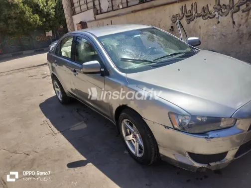 ميتسوبيشي لانسر 2014 رمادي غامق مستعملة للبيع - 3