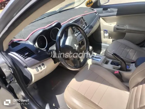 ميتسوبيشي لانسر 2014 رمادي غامق مستعملة للبيع - 5