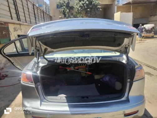 ميتسوبيشي لانسر 2014 رمادي غامق مستعملة للبيع - 6