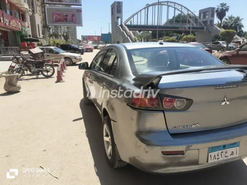 ميتسوبيشي لانسر 2014 رمادي غامق مستعملة للبيع - 9