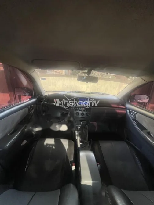 تويوتا كورولا 2003 فضي مستعملة للبيع - 1